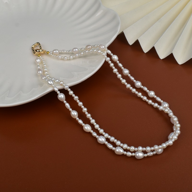 Layered natural freshwater pearl necklace for women, 2025 new style collarbone chain, high-end, light luxury and niche sweater chain accessory