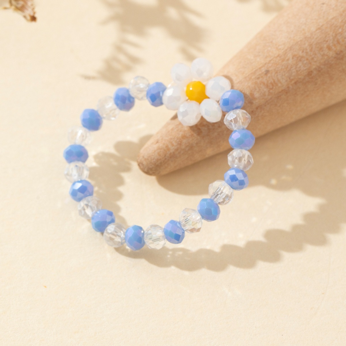 Fresh and elegant elastic rope plum blossom color crystal ring for women, new fashionable and versatile, niche and individual ring jewelry wholesale details Picture