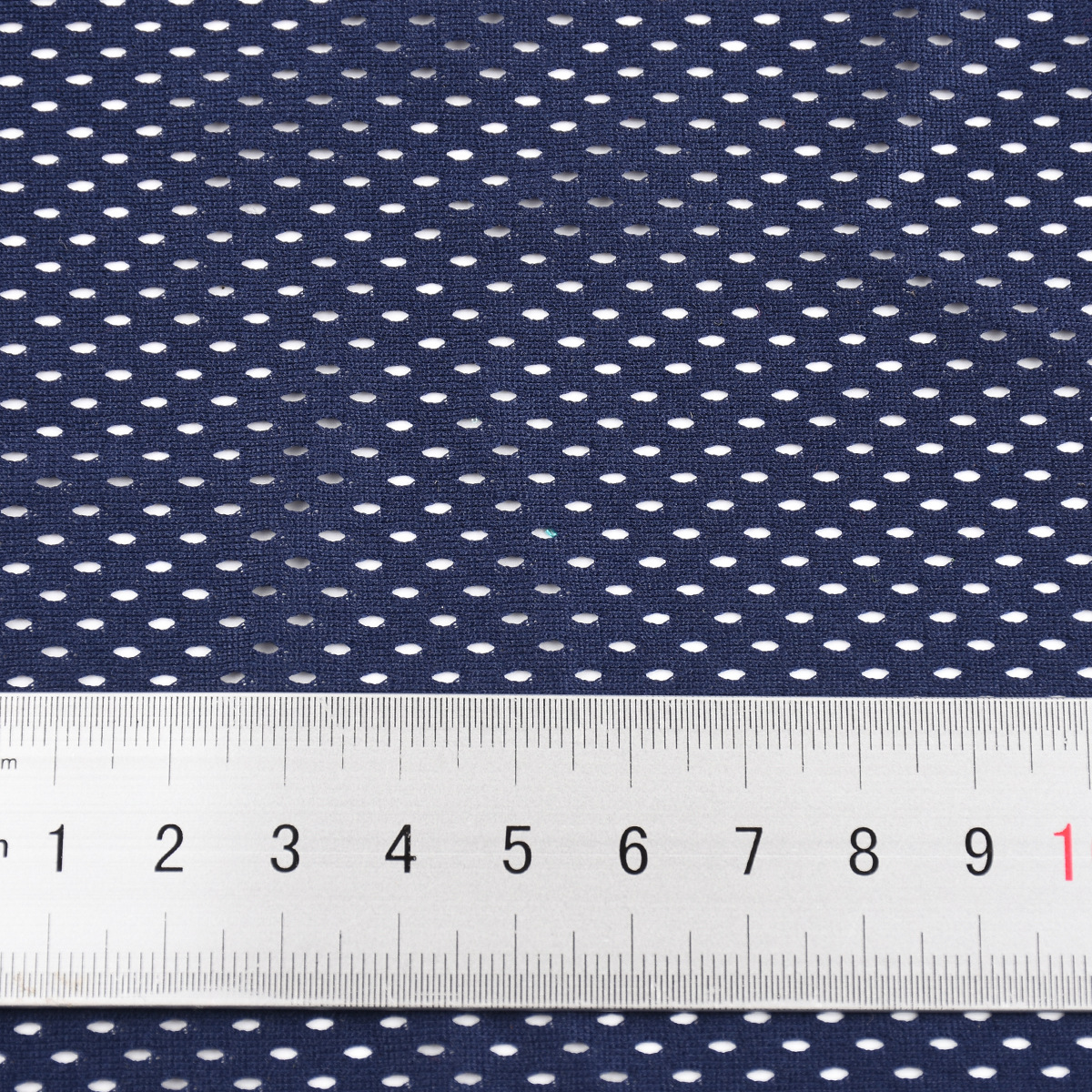 Factory direct supply of 75D low-elasticity seven-hole and one-hole fabric warp knitted mesh fabric breathable and quick-drying sportswear and shoe material fabric details Picture