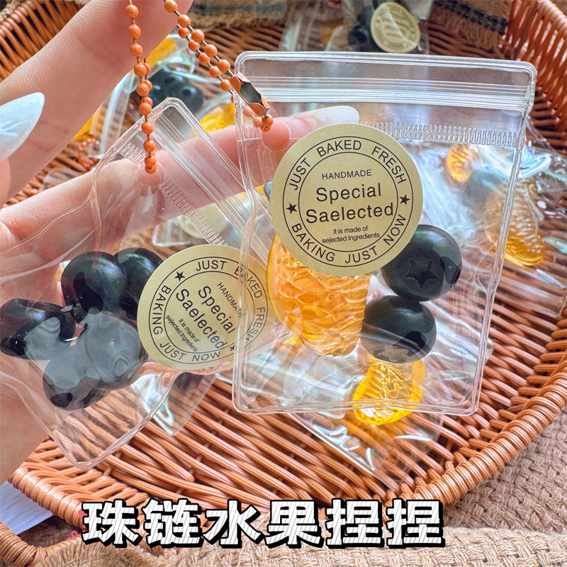 Xiaohongshu Douyin Stress-relieving simulation blueberry mini fruit Bag Squeeze Fun Strawberry Kiwi Squeeze a slice of orange Specification image