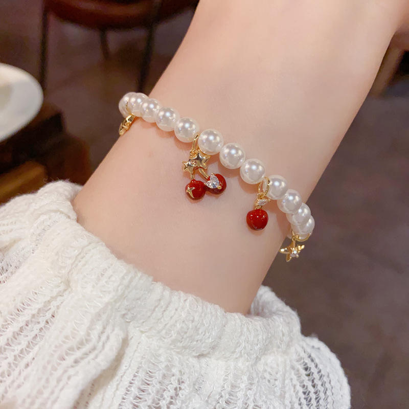 Europa y américa cross-border personalidad moda suave y versátil estrella de montaña rojo cereza perla pulsera temperamento dulce y fresco decoración de la mano