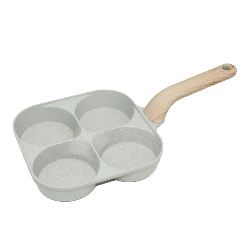 عبر الحدود، تعمق مقلاة البيض غير اللاصقة في مقلاة الإفطار ذات الأربعة مسام Item Picture