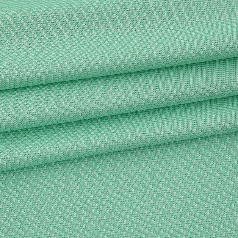 现货批发涤纶面料低弹网眼布料速干运动高品质涤仿棉提花布料