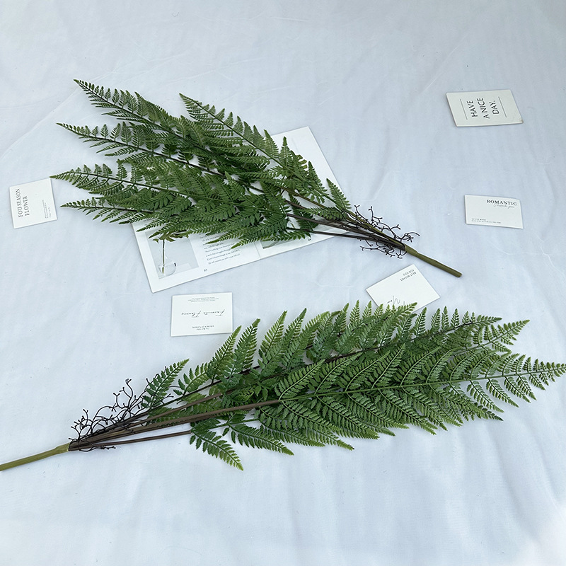 The new wedding home hotel landscape decoration features simulated green plant and fern leaf ground landscaping, complemented by plant fern leaves Application Scenario