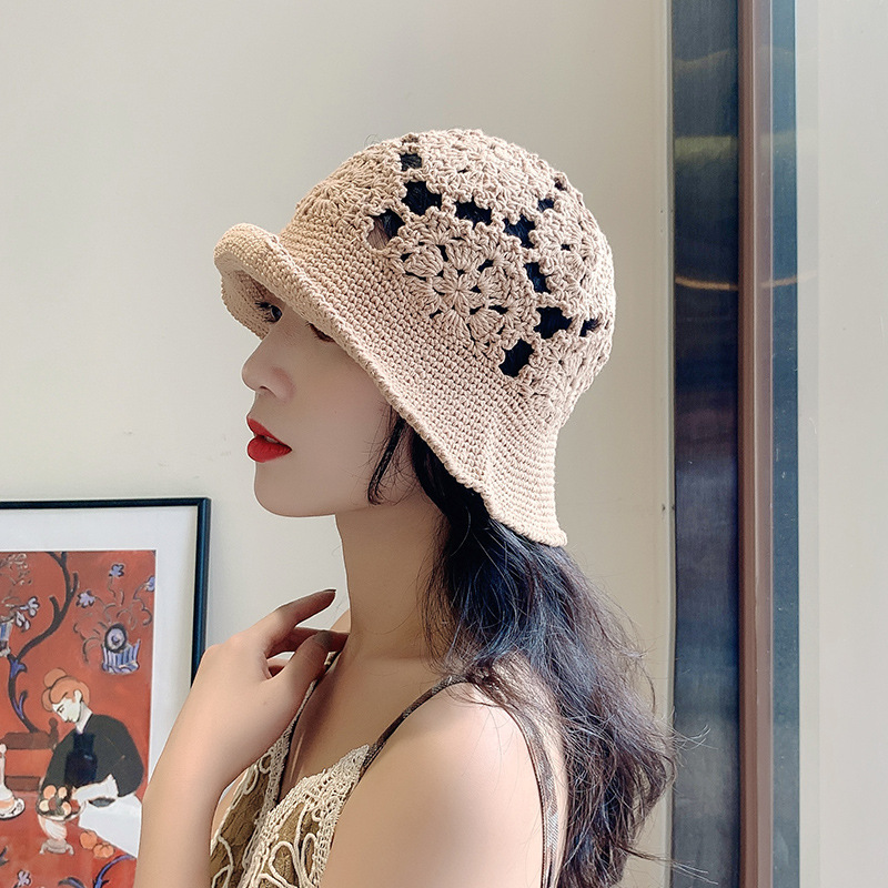This is a breathable spring and autumn vintage handcrafted hollowed-out hat, a female fisherman's hat, and a Korean-style summer sun protection hat