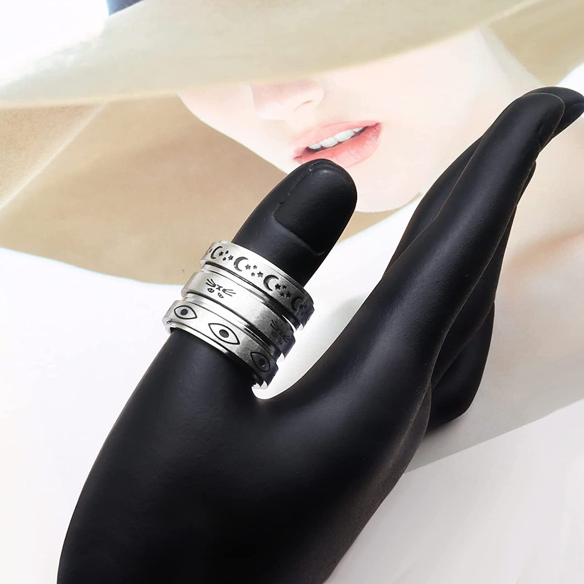 Amazon cross-border stainless steel pressure-reducing rotating star and Moon ring Titanium steel couple accessories Devil's Eye Ring Application Scenario