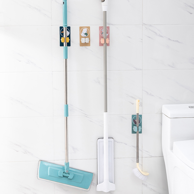 Cartoon mop stand, broom booth, mop hook, strong traceless, non-drilling mop clamp, bathroom wall hanging rack adhesive hook Application Scenario