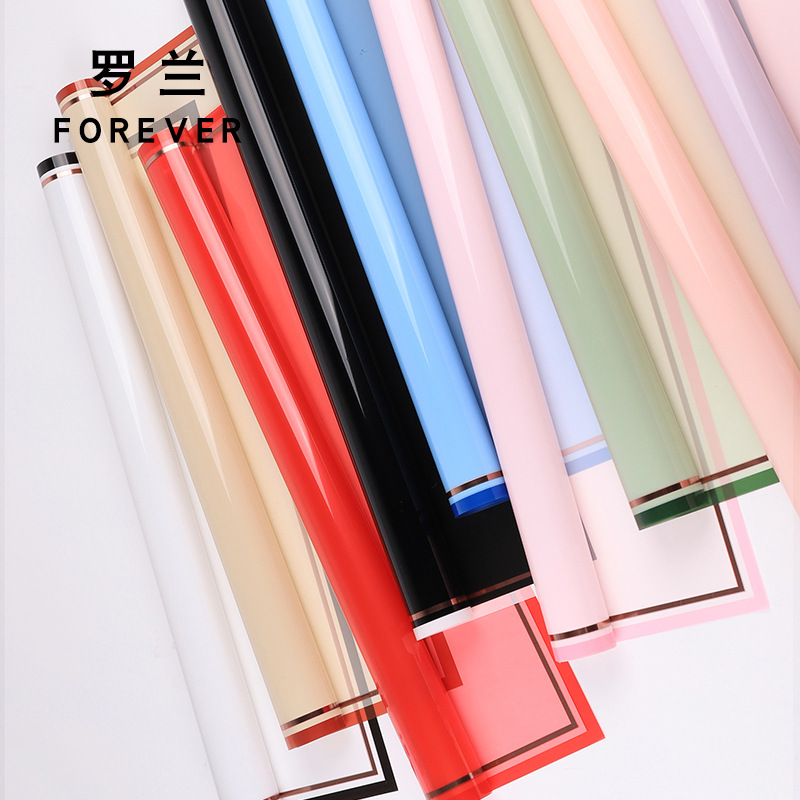 罗兰 烫金世界之窗鲜花包装纸防水opp膜礼物花店花束包花材料批发产品图