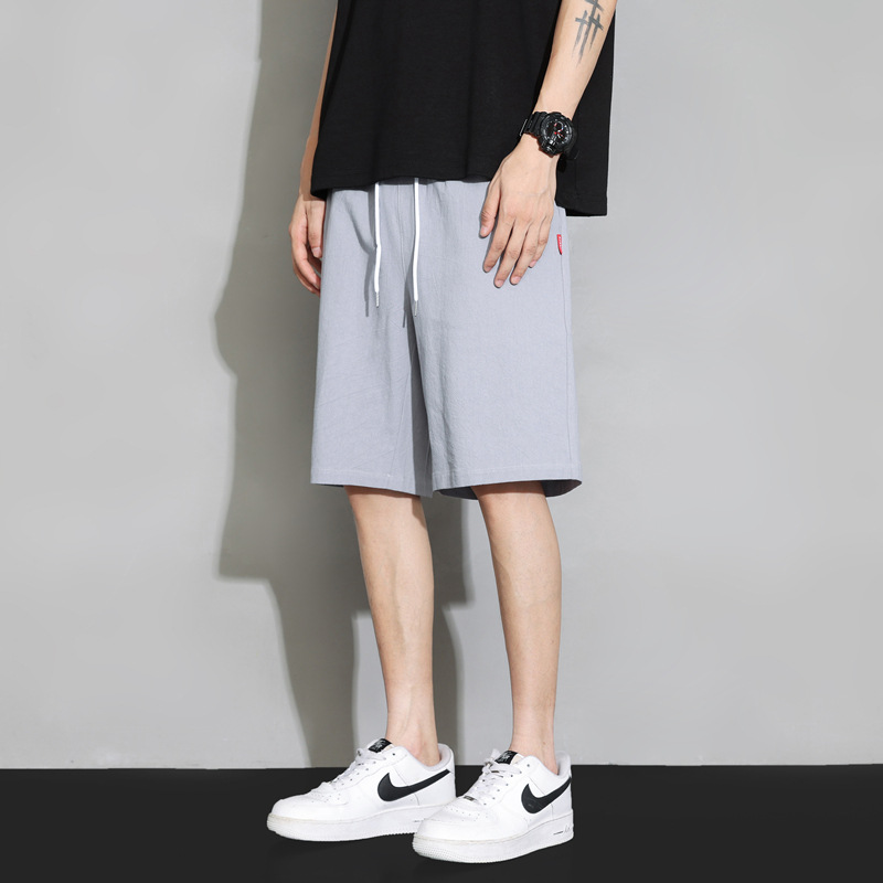 裤子/卫裤/华棉裤子/男裤/裤子男士宽松休闲白底实物图