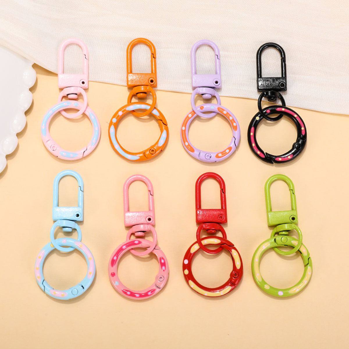 Colorful hand-painted opening rings, door buckles, keychains, diy dolls, bags, doughnuts, spring buckles, hanging ornaments and accessories Specification image