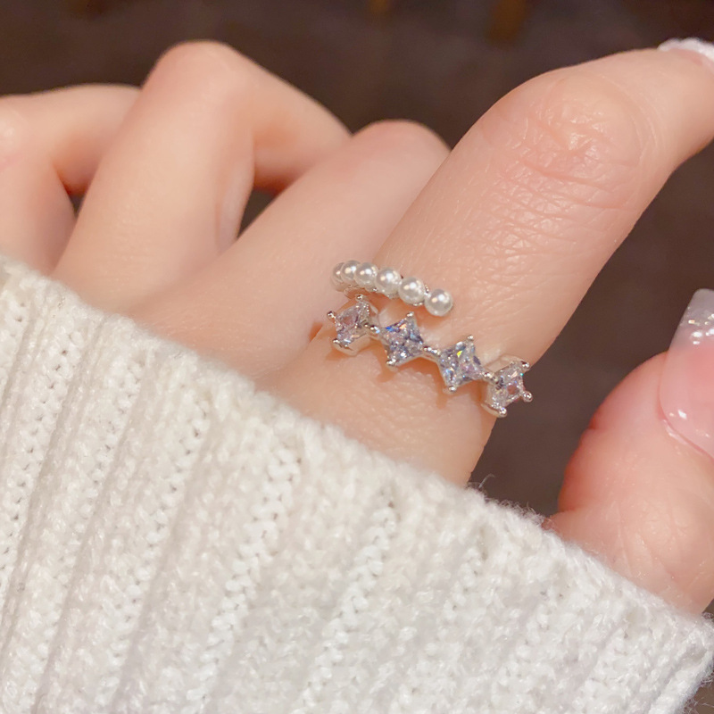 The light luxury slightly inlaid star pearl open ring exudes a sense of sophistication for women. The adjustable index finger ring is a simple and niche jewelry