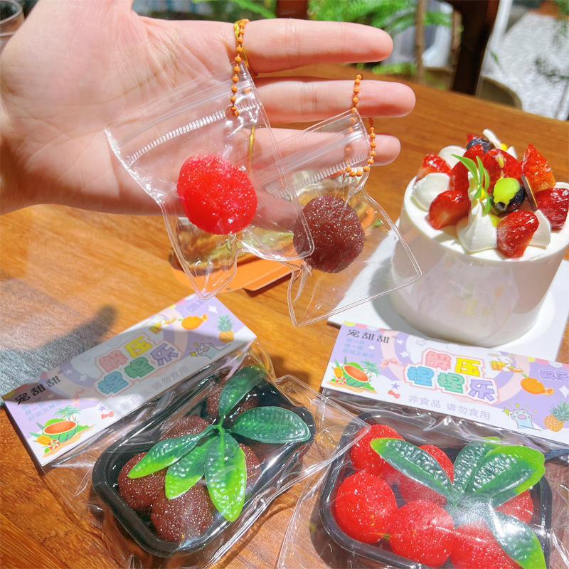 The same style of "Little Red Book" bayberry Pinching fun simulation stress-relieving and venting tool, fruit pinching creative and fun fruit toys Application Scenario