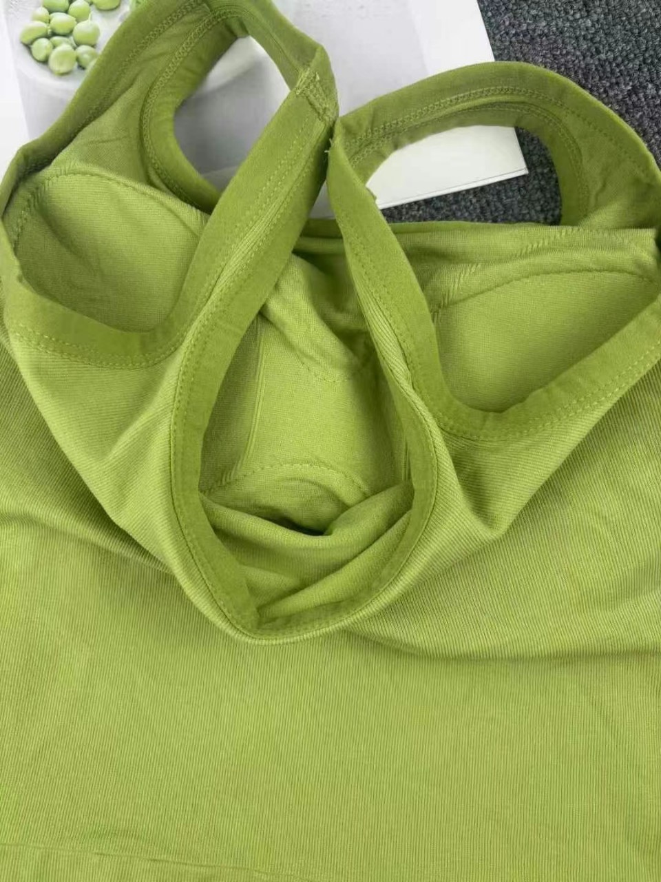 For export to Africa, we offer a solid color strappy vest for women, a one-piece underwear with a chest pad, a versatile base layer, and a sleeveless top Application Scenario