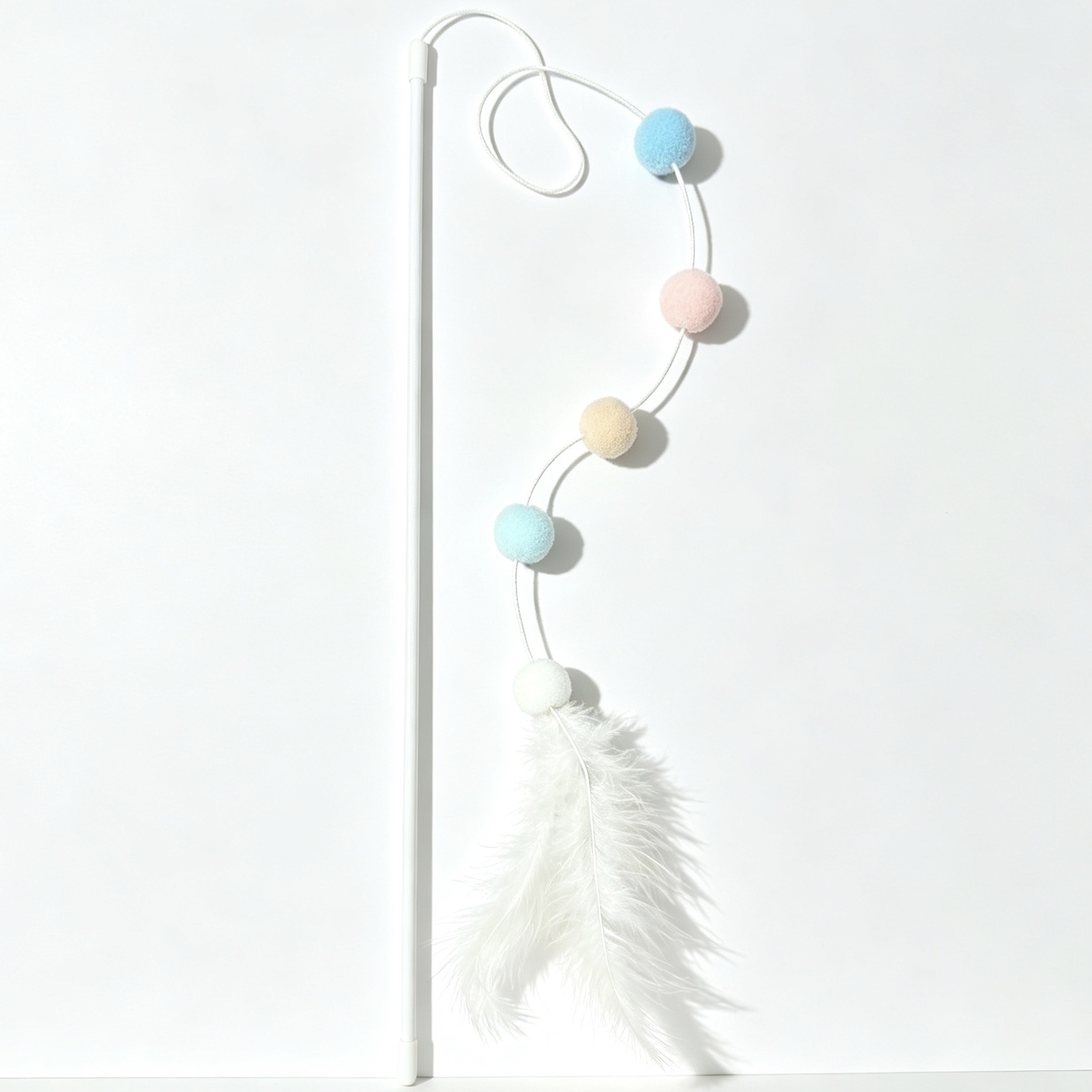 Wholesale of macaron fur balls, feathers, Korean cat toys, long rods, fairy soft ropes, colorful balls, interactive toys and pet supplies Application Scenario