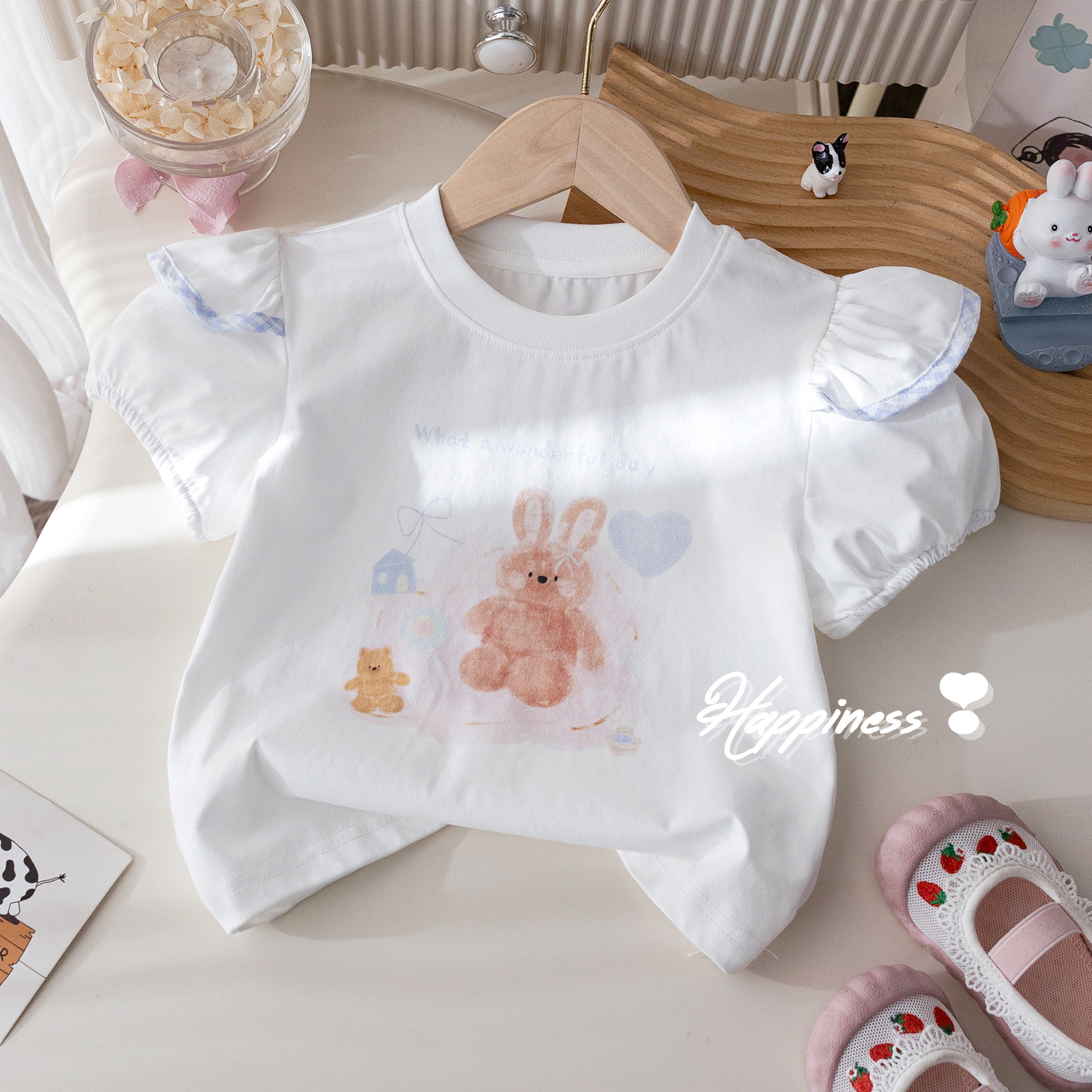The summer new cartoon print T-shirt for girls is fashionable, and the two-piece set of checked bow flower bud pants is trendy Specification image