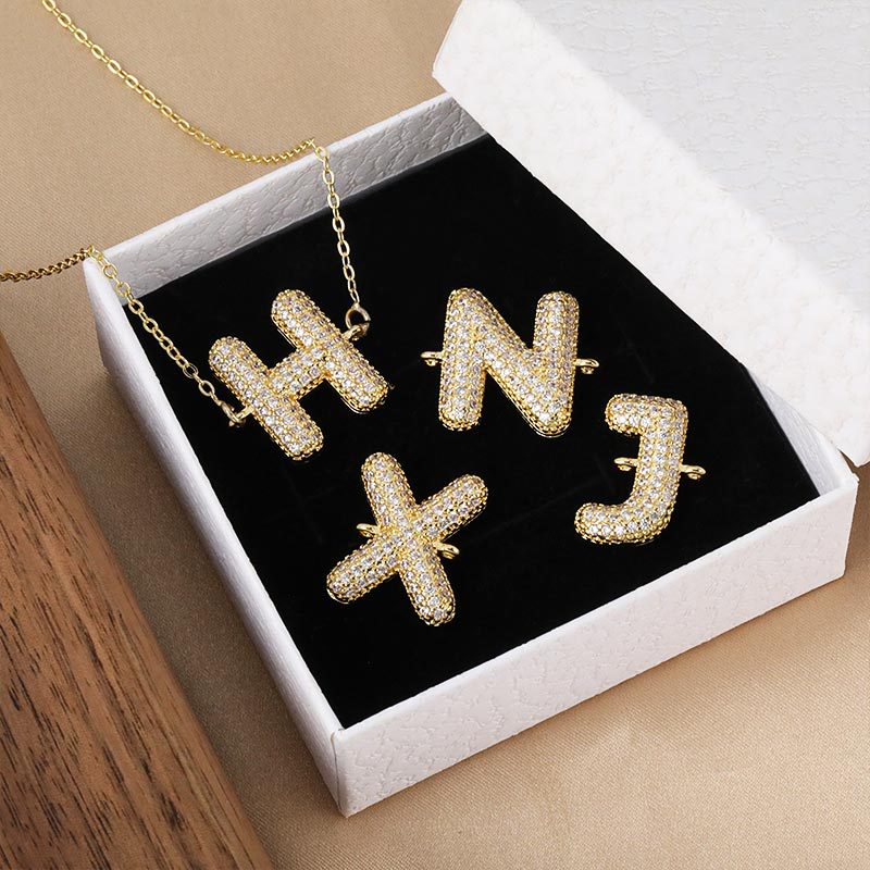 Honglu Cross-border's new 26-letter English letter pendant necklace accessory, a fashionable copper-plated and zircon pendant accessory details Picture