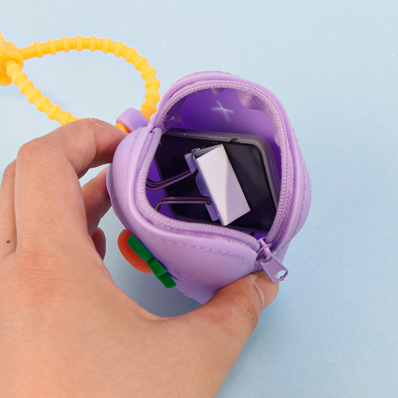 Wholesale of best-selling mini DIY hole coin purges, cute children's small square bags, headphones, data cables, and coin storage cases Application Scenario