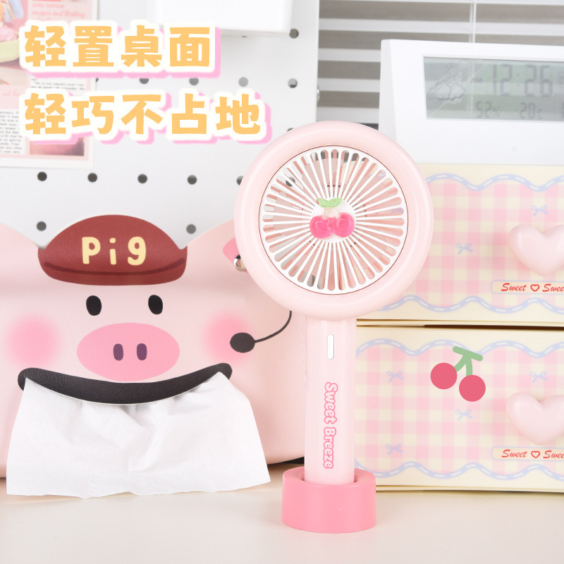 New cross-border cartoon handheld mini fan, summer cherry outdoor USB charging with light, student gift electric fan Specification image