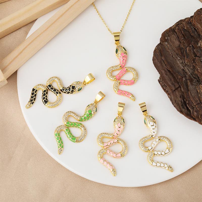 Wholesale and direct sales of new and popular micro-inlaid zircon oil-drip zodiac snake-shaped pendant accessories with cross-border personalized electroplated design
