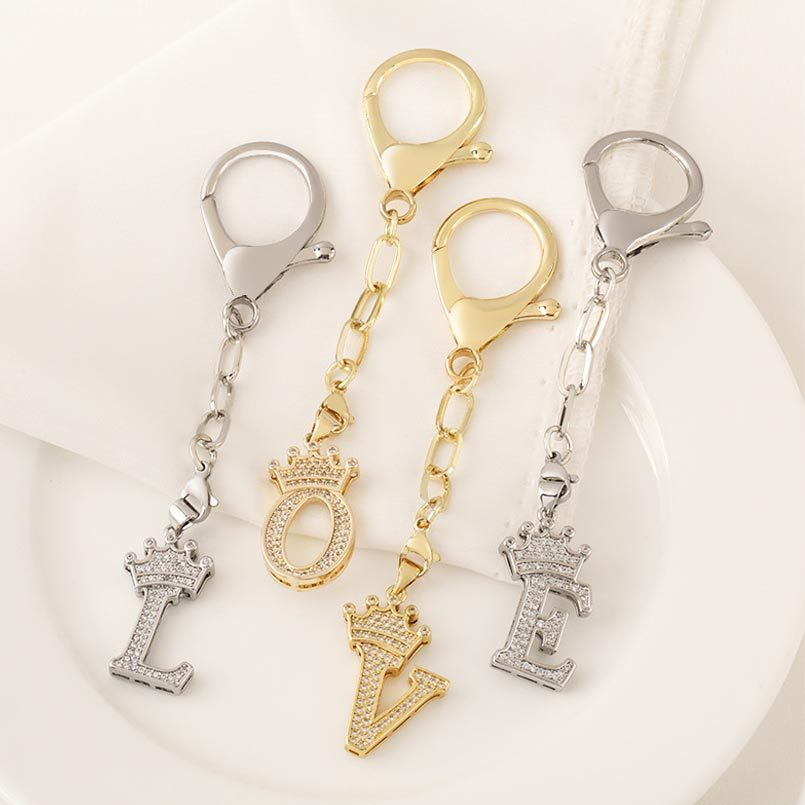 Zirconium-inlaid cross-border 26 English crown letter keychain women's European, American and Korean style fashionable bag pendant wholesale full figure