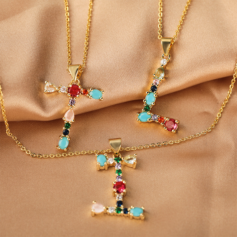 A cross-border copper micro-inlaid colored zircon pendant with 26 English letters, a niche hip-hop necklace and collarbone chain Application Scenario