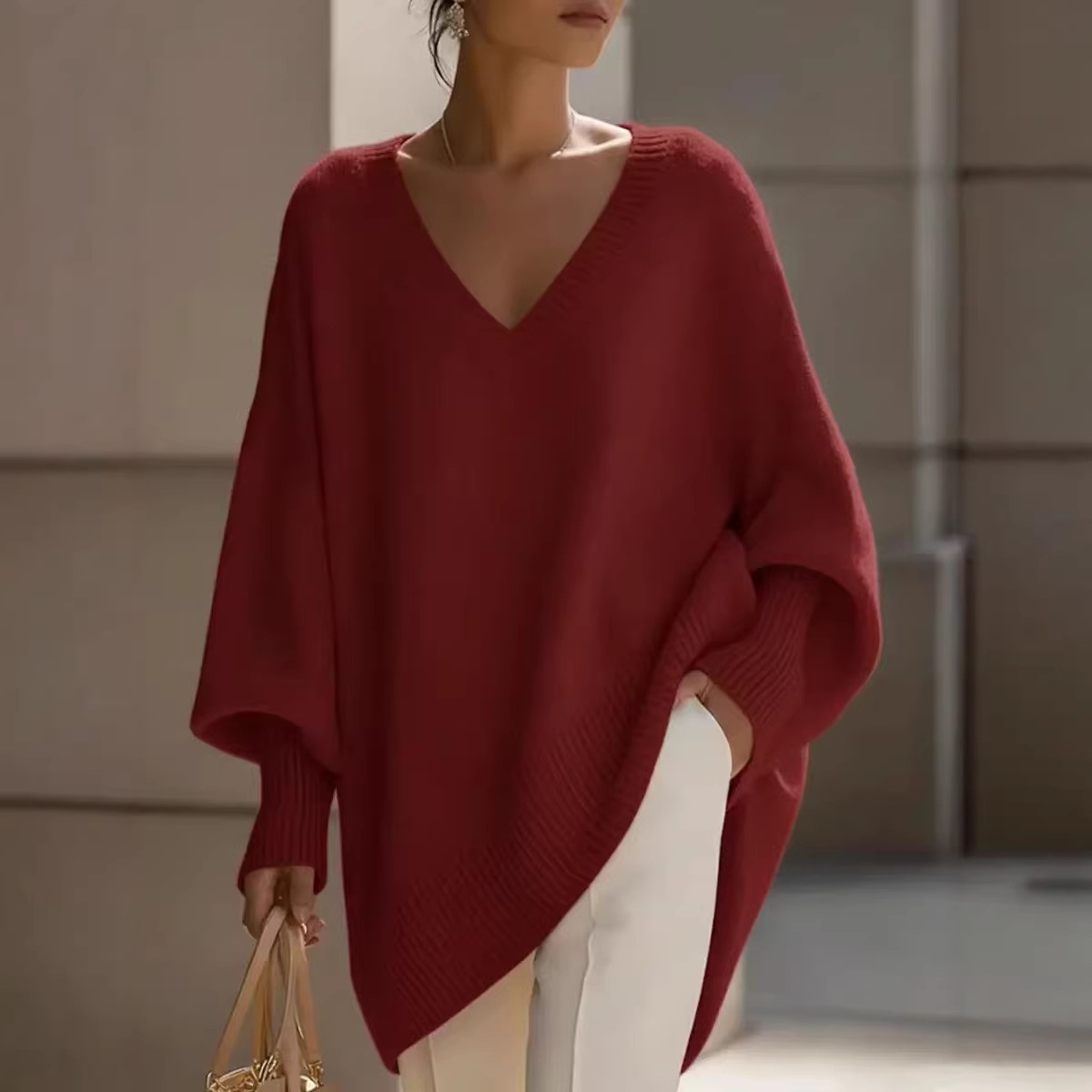 Independent station 2026 Spring Cross-border solid color long-sleeved V-neck laid-back style sweater women's loose knitted top Specification image
