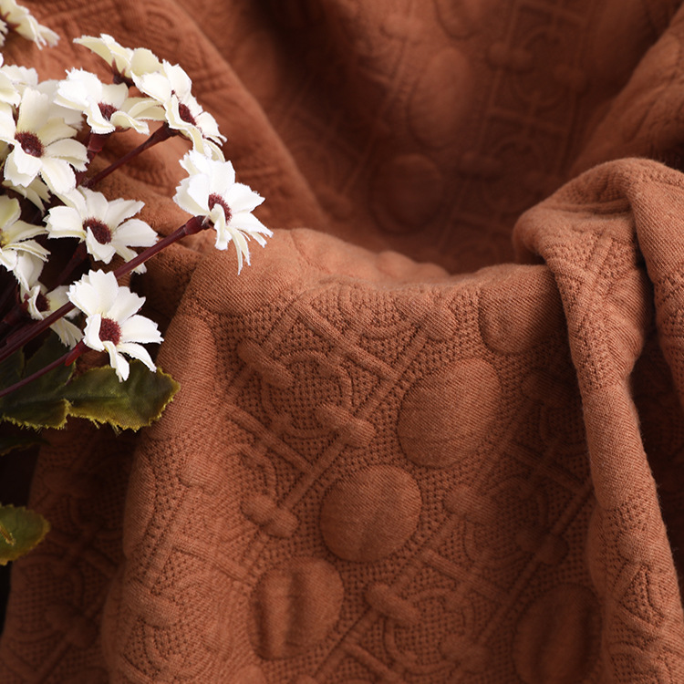 The manufacturer supplies knitted fabric elastic dyed cotton-like polyester yarn weft knitted jacquard air layer baby and children's fabric details Picture