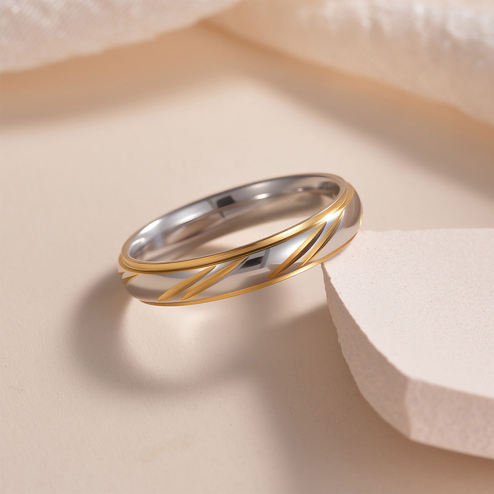 Cross-border stainless steel couple rings, golden diagonal diamond-encrusted rings, European and American fashionable wedding rings for men and women Application Scenario