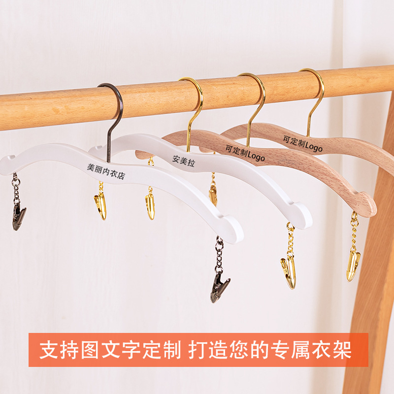 Wholesale of high-end clothing store hangers imitating beech wood grain plastic hangers, anti-slip and traceless women's plastic underwear clips details Picture