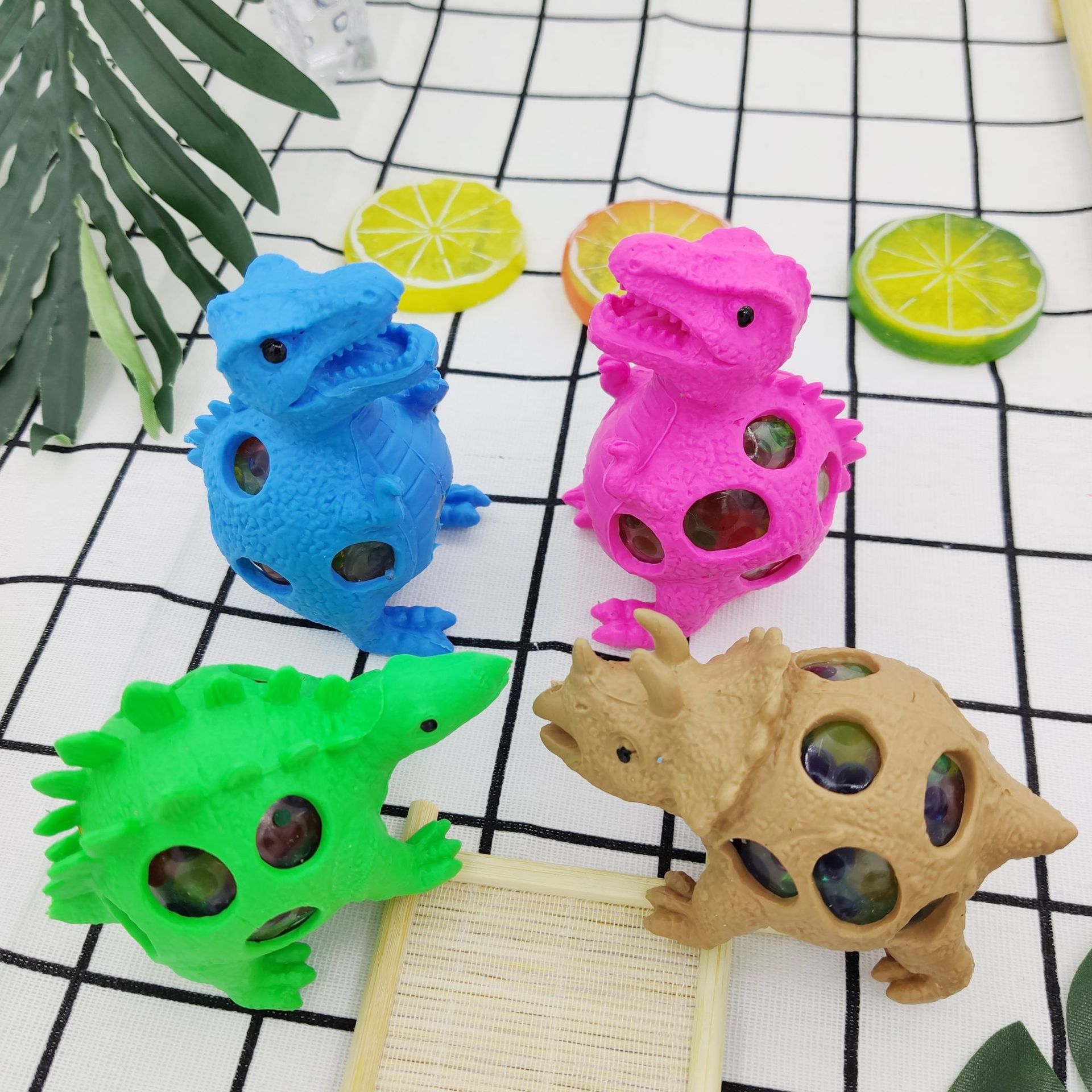 Dinosaur venting balls, dinosaur colored beads, grape balls, TPR venting balls, factory direct sales, venting toys, Pinching fun Application Scenario