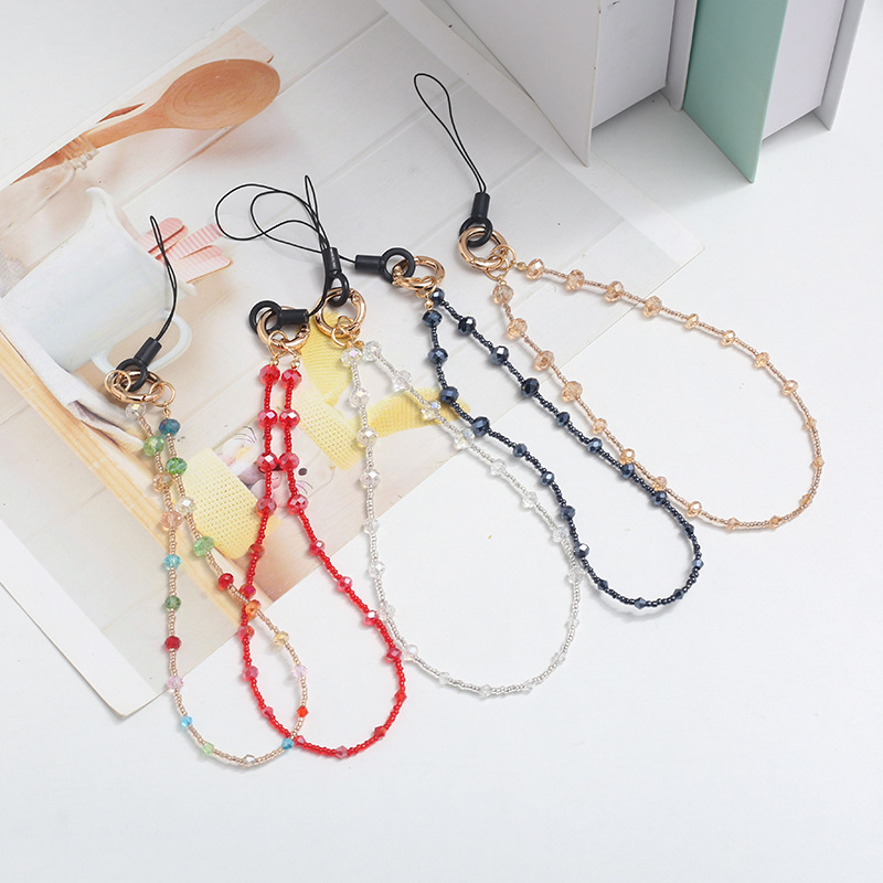 Wholesale of new fashionable beaded crystal rice beads for mobile phone chains, phone cases, alloy buckles, lanyards, pendants and anti-loss wrist straps