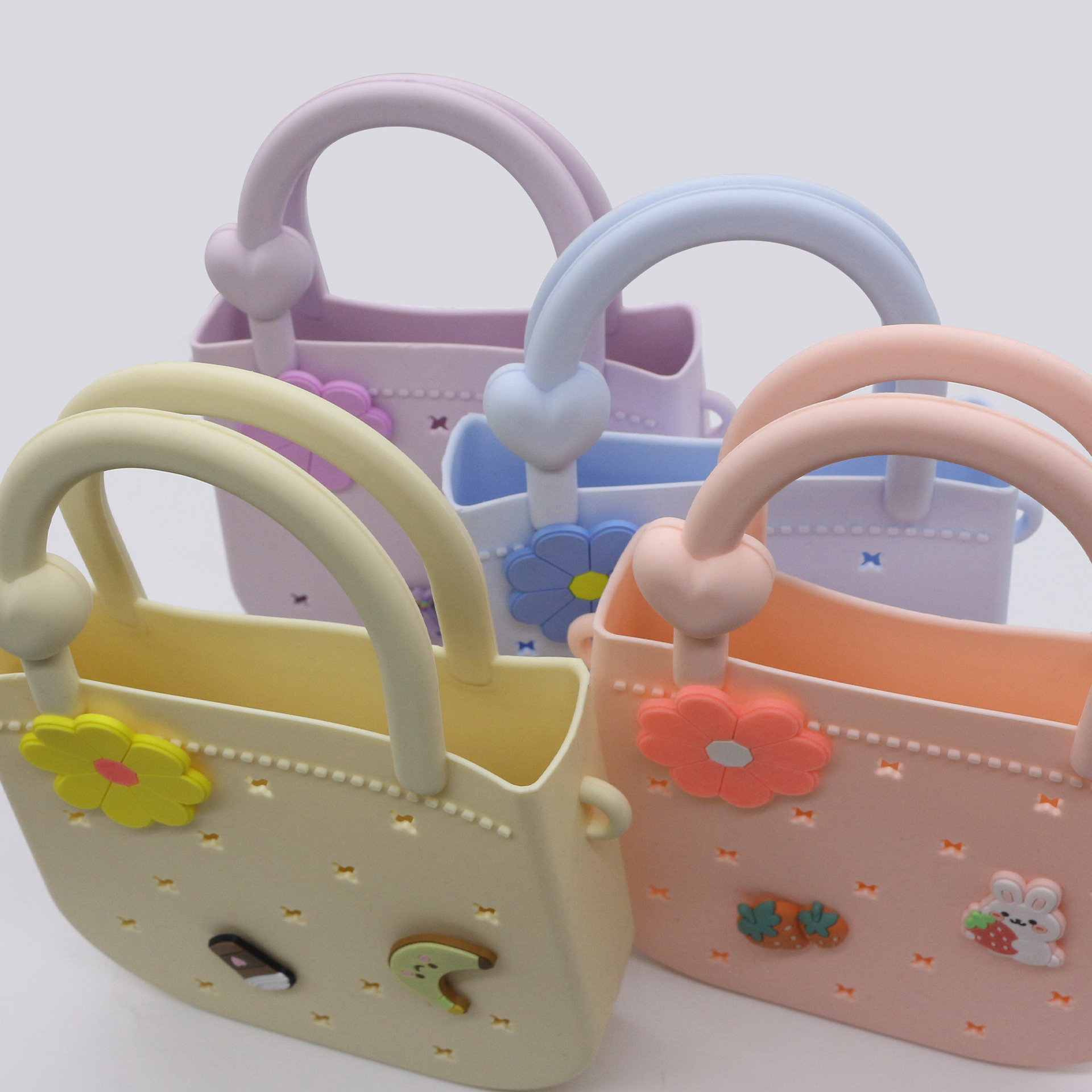Cross-border best-selling DIY silicone hole bags, cartoon children's beach handbags, mobile phone storage bags, factory direct sales details Picture