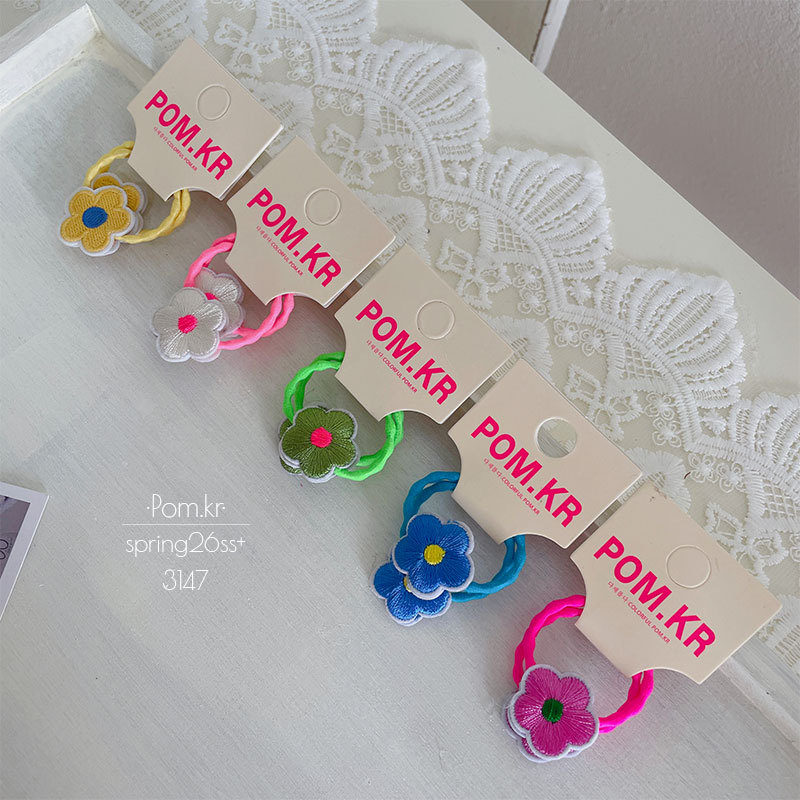 Primavera nuevo dulce color flores garras niños high stretch cola de caballo croquetas cabeza cordón bebé mano accesorios para el pelo Application Scenario