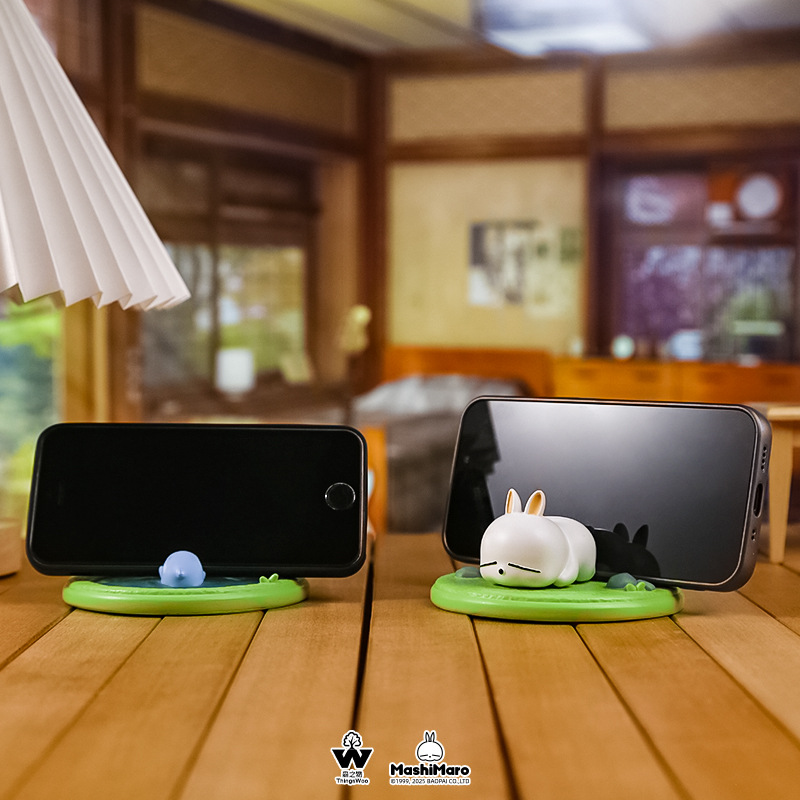 Cartoon Rogue Rabbit mobile phone stand ornament, a Douyin hit Rogue multi-purpose mobile phone stand creative stand ornament details Picture