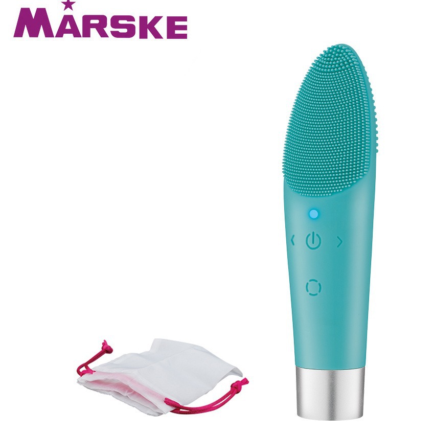 粉色面部清洁设备包装盒白色USB充电线女性背景人物细节图