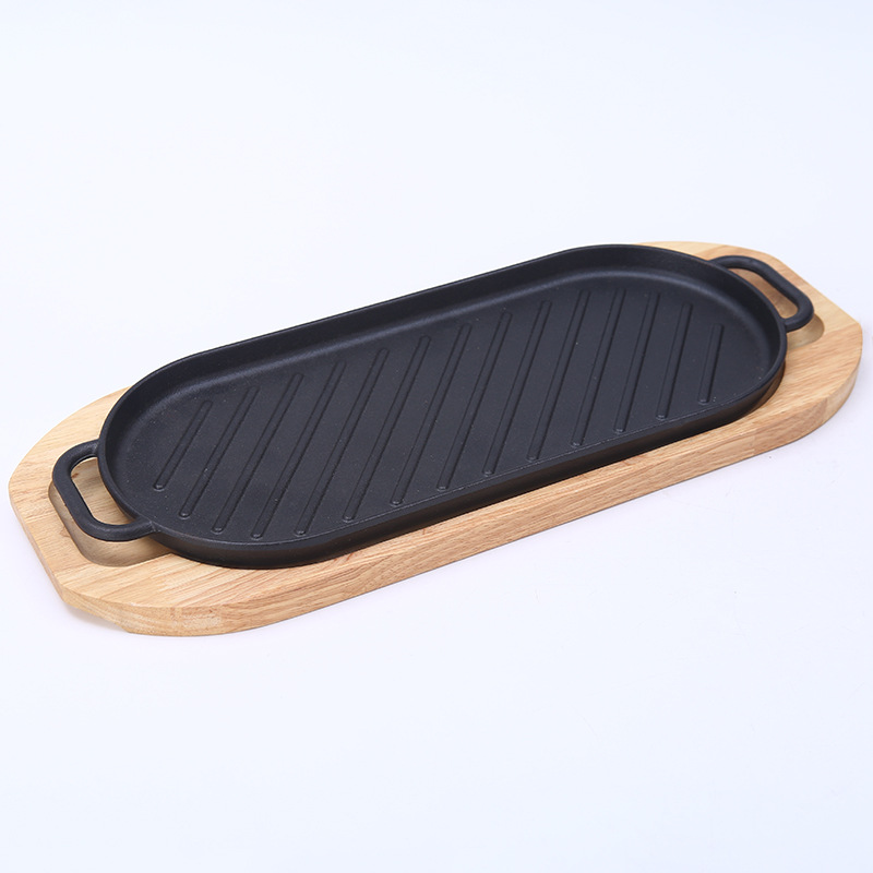 Cast iron outdoor steak teppanyaki double-ear oval induction cooker barbecue plate, household pine board fish frying and grilled meat plate Item Picture