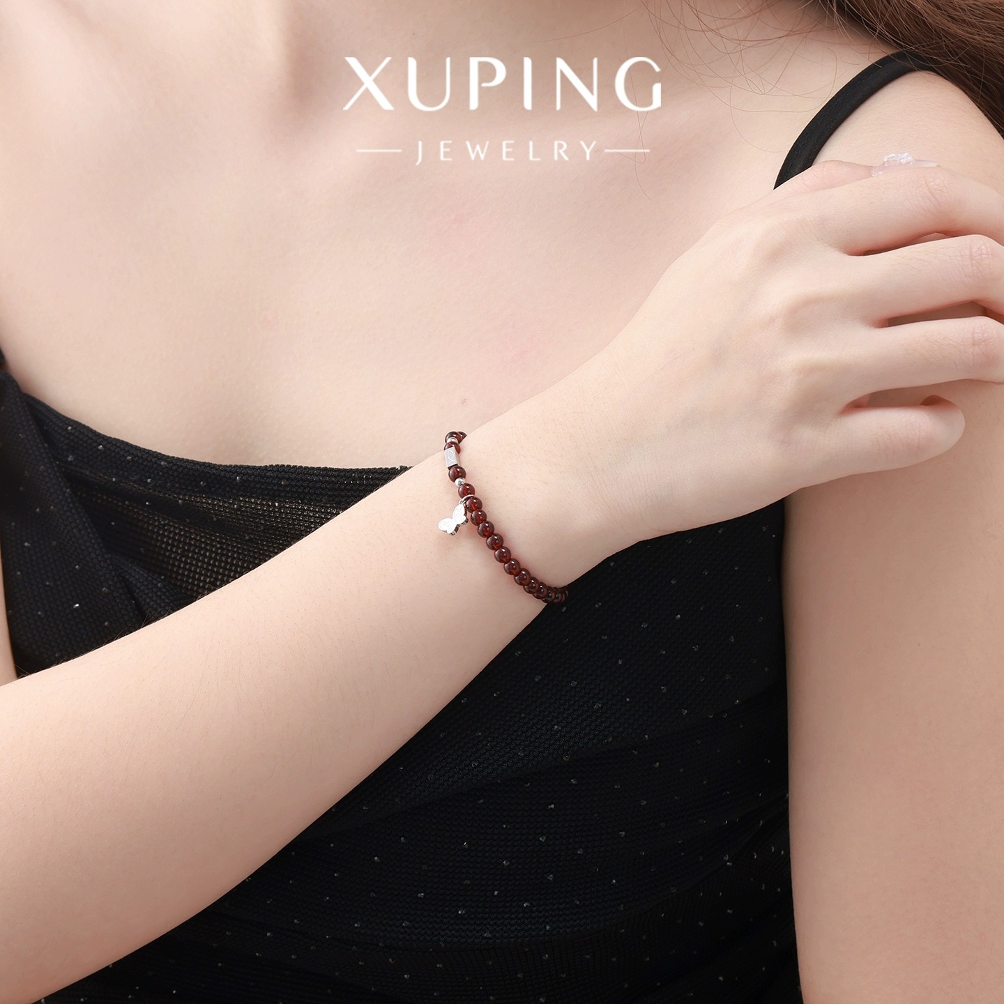 Xuping's new Chinese-style fashionable and simple round bead bracelet exudes an elegant and refined charm. It features butterfly tassels and a garnet red imitation New Year's jewelry for women Specification image