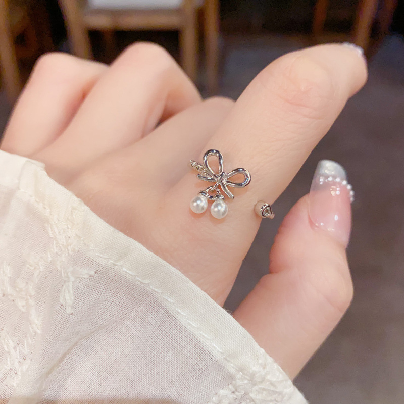 Summer's new fashionable and simple metal bow pearl open ring for women's niche luxury, gentle and versatile index finger ring