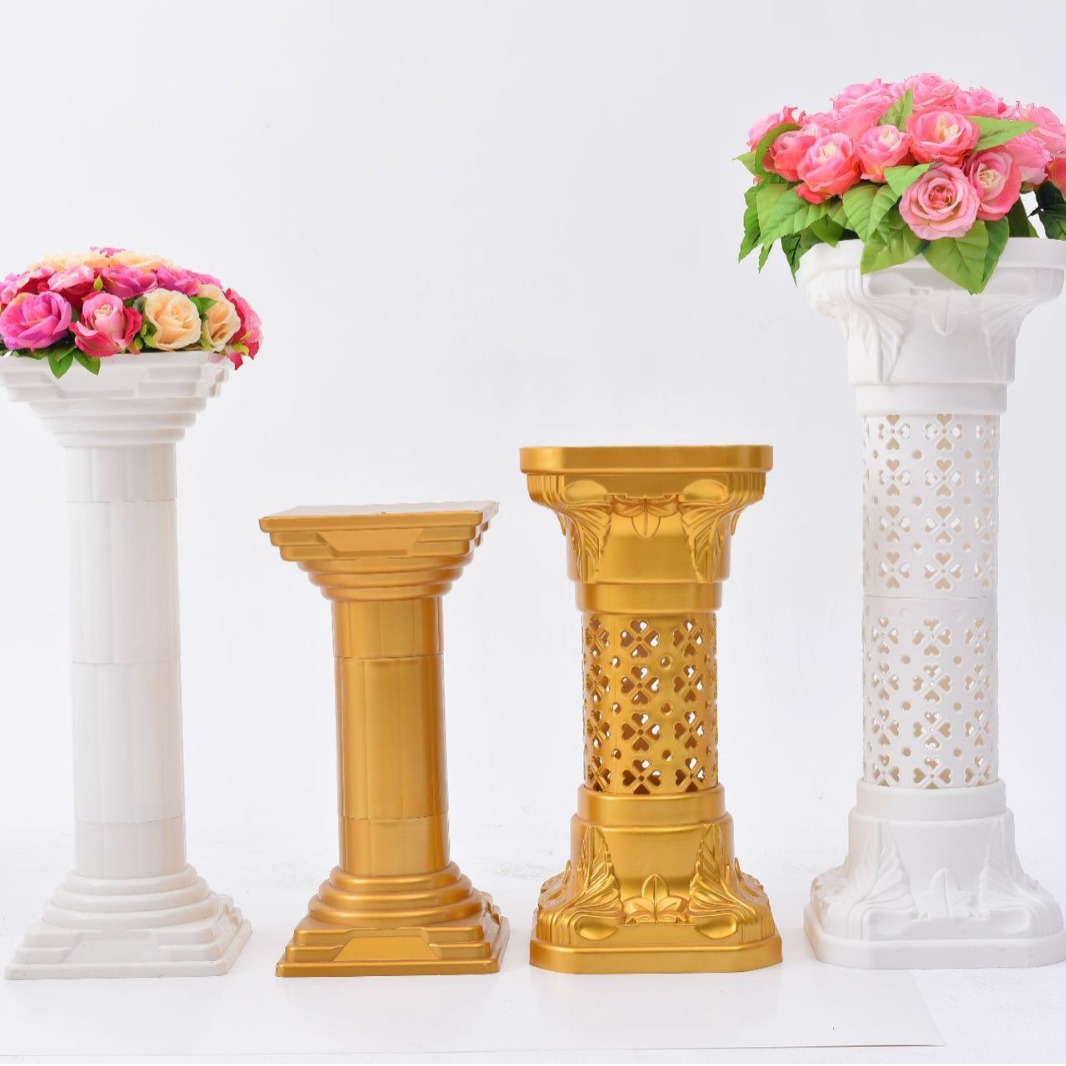 The stage props and ornaments for the wedding hotel are placed with golden plastic Roman Columns and leading decorations, measuring 32.5*32.5*91cm The stage props and ornaments for the wedding hotel are placed with golden plastic Roman Columns and leading decorations, measuring 32.5*32.5*91cm