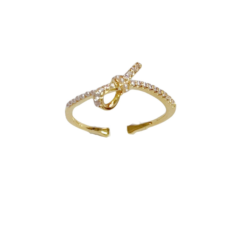 Wholesale of high-end index finger rings with a unique and fashionable design sense, featuring a zircon knot and an open ring that exudes a feminine charm, is simple, luxurious and versatile Application Scenario