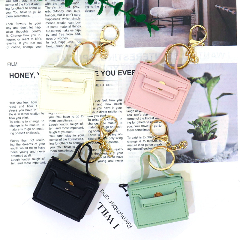 Huayang's new multi-functional small square bag features a creative mouth, red envelope, keychain, earphone bag, and a car-carrying pu key chain pendant Specification image