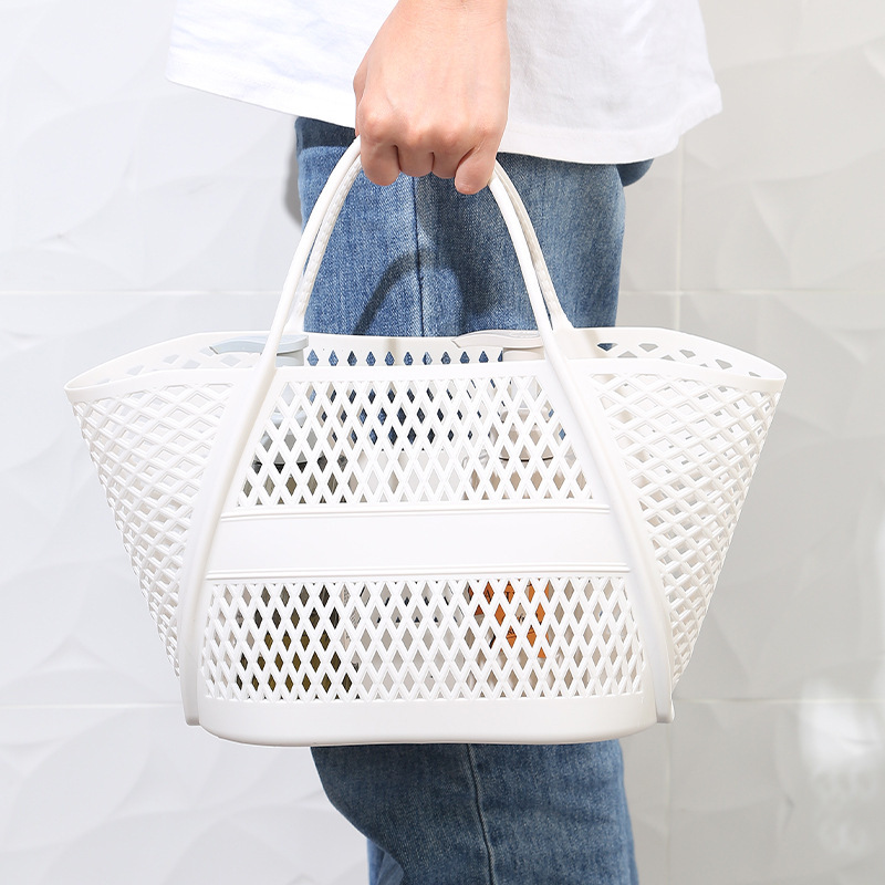 New thickened plastic draining hand-held basket for household use, hollowed-out storage basket for bathroom, bath and toiletries details Picture
