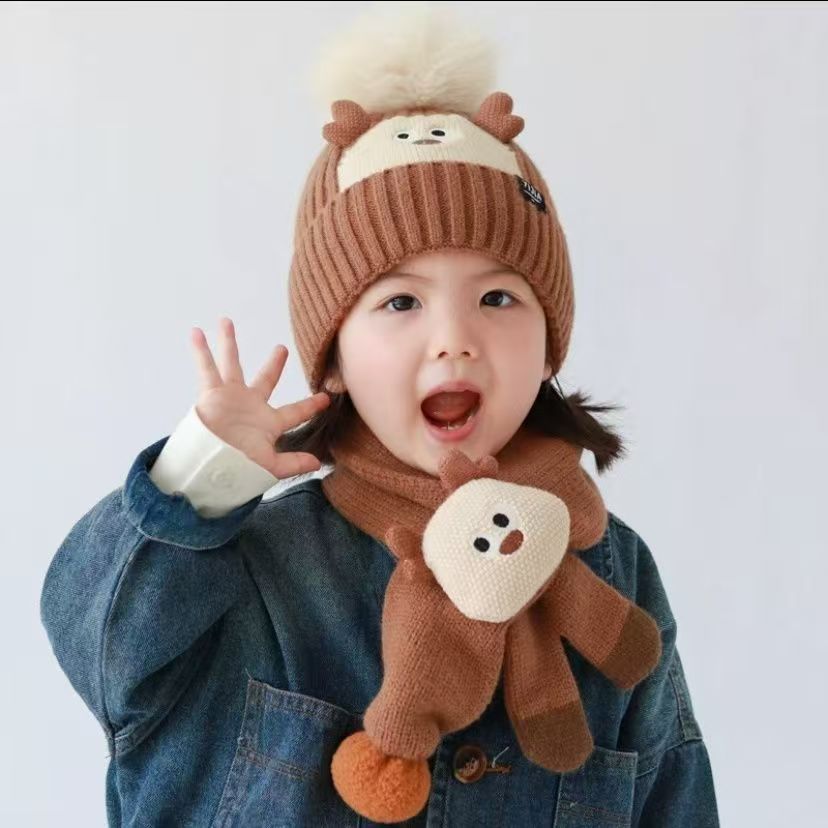Wholesale of one-piece children's hats, scarves, cartoon autumn and winter ear-protecting knitted warm and cute woolen hats for boys, girls and babies at street stalls Specification image