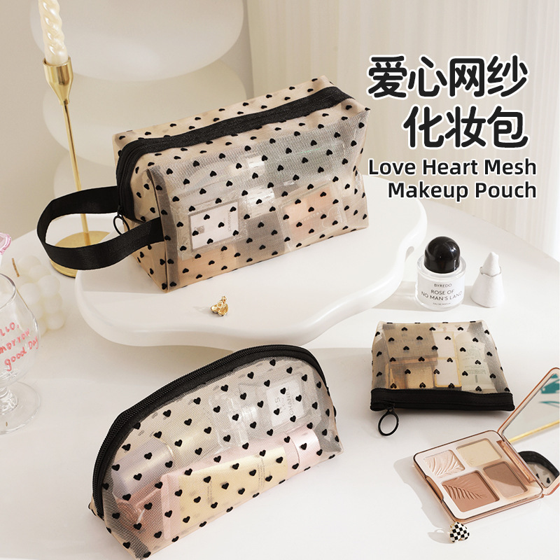 New heart-shaped makeup bag, hand-held large-capacity mesh storage bag, women's Instagram-style portable travel small toiletry bag