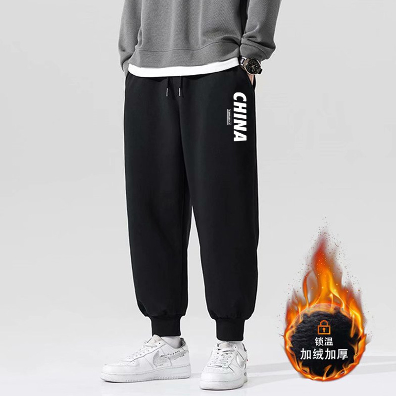 Casual sweatpants for men's autumn and winter, new Korean-style oversized, thickened, trendy printed fleece pants in stock for wholesale full figure