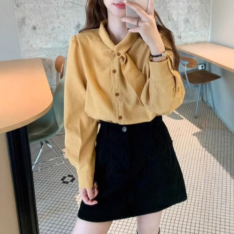 A French retro white bow tie top for women in autumn and winter, paired with a puffed-sleeve corduroy shirt and a stylish inner shirt Item Picture