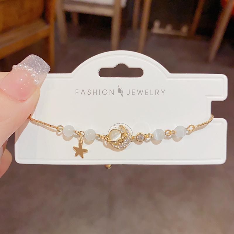 A new sweet and cool summer style planet Moon cat's eye stone pull-out bracelet for women, presenting a fashionable and high-end look details Picture