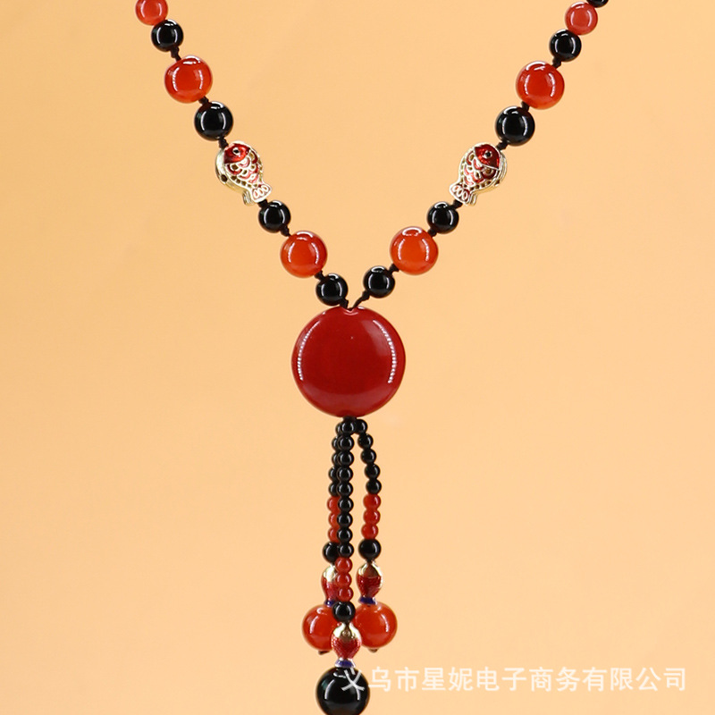 Wholesale of new "Yearly Fish" long agate necklace, retro ethnic style decorative sweater chain, pendant and accessory details Picture
