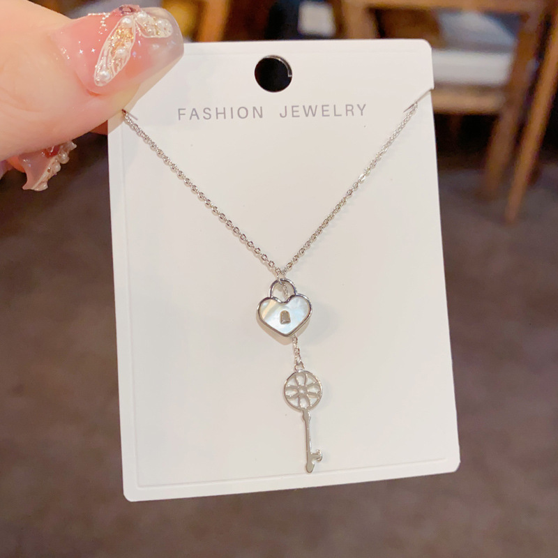 Korean style, fashionable design sense, heart lock, key, tassel pendant necklace, unique, light luxury, versatile collarbone chain for women Application Scenario