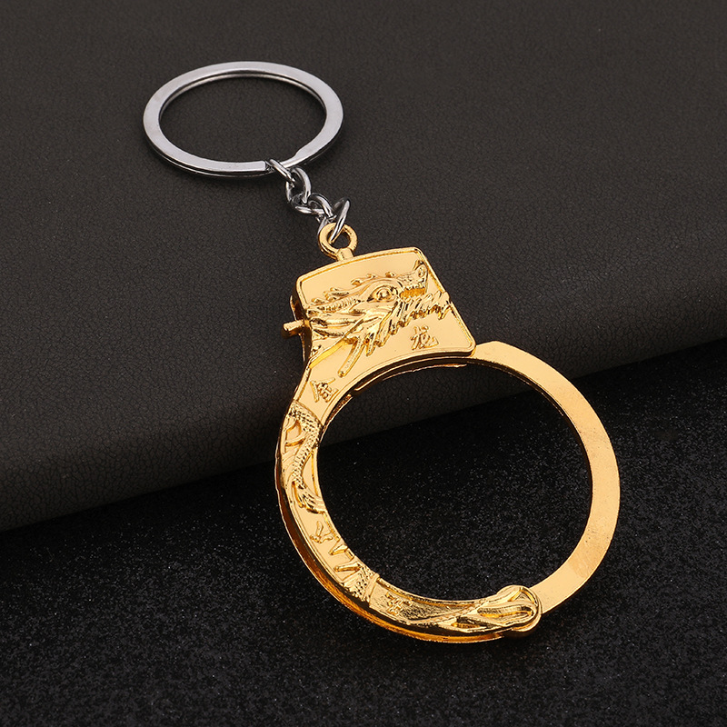 钥匙扣/钥匙扣公仔挂件/马卡龙钥匙扣/流沙入油玩具/挂饰产品图